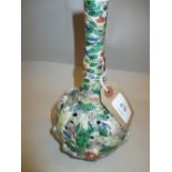 20th Century Chinese stoneware bottle vase with pierced body decorated in high relief with all-over