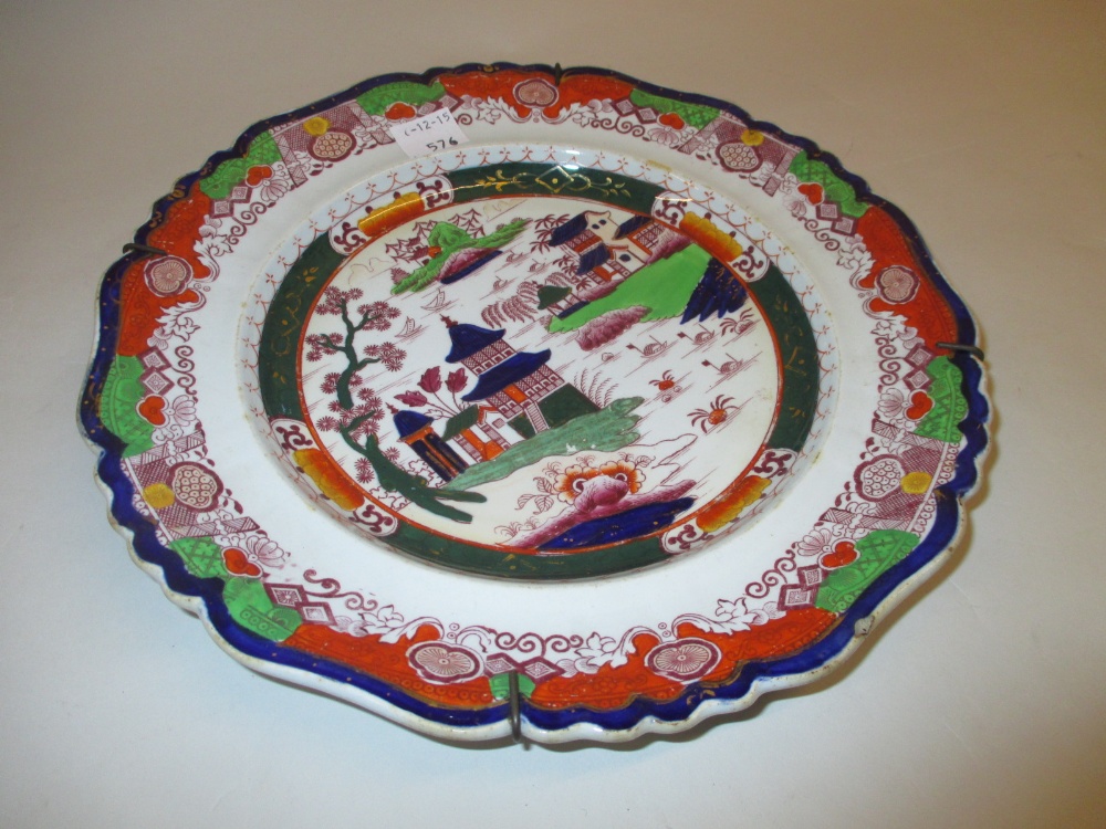 Pair of large 20th Century Continental circular pottery wall plates with floral decoration together - Image 2 of 2