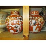 Pair of large Japanese Kutani bulbous form ginger jars and covers decorated with various figures