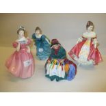 Group of four Royal Doulton figures, ' Southern Belle ' HN2229, ' Camellia ' HN2222,