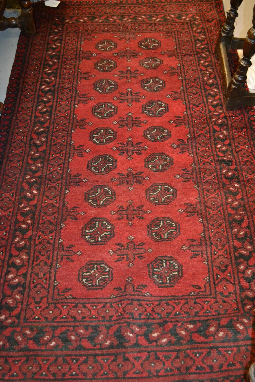Afghan style rug having red ground, 1.92m x 1.