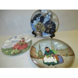 Group of four Royal Doulton character plates,