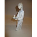 Lladro figure of a girl with a chamber stick in original box,