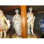 Pair of continental porcelain figures of a lady and gallant,