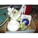 Pair of pottery bookends in the form of reclining nude females,