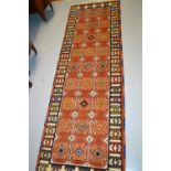 Rust ground Heriz style runner, 2.2m x 0.