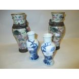 Pair of late 19th Century Canton famille rose crackle glazed baluster form vases together with a