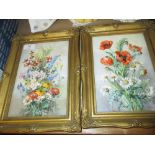 Pair of K.P.M. floral painted on porcelain wall plaques, signed R.