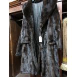 Ladies three quarter length dark mink coat by Halston