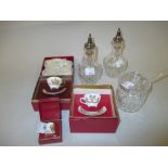 Two miniature cups and saucers and a thimble all in original boxes together with a pair of silver