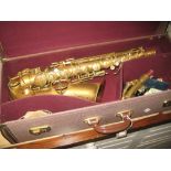 Cased tenor saxophone by Conn