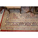 Large Indo Persian rug having pale blue, red and cream ground with multiple borders,