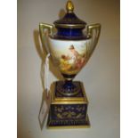 Vienna two handled urn shaped porcelain pedestal vase, painted with classical figures, signed Heer,
