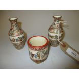 Pair of Satsuma miniature bottle shaped vases,