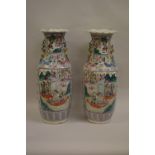 Pair of large Chinese Canton famille rose baluster form vases with dragon handles,