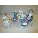 Four various Lladro figures of children