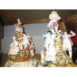 Pair of large 19th Century Continental porcelain figural groups of ladies and gentlemen (with