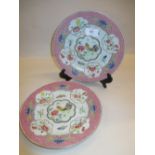 Pair of Chinese famille rose plates decorated with cockerels