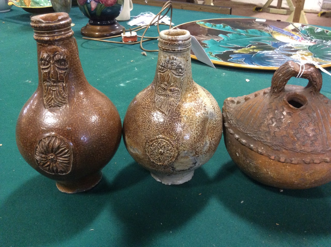 TWO SALT GLAZE BELLARMINES each with a bearded mask to the neck and a star rosette to the body, - Image 2 of 4