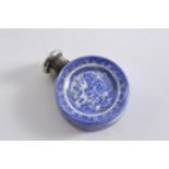 A LATE VICTORIAN MOUNTED GLAZED POTTERY SCENT BOTTLE in the form of a blue & white Willow pattern