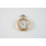 A LADY'S GOLD AND ENAMEL FOB WATCH the white enamel dial with blue Roman numerals, with engraved