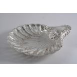 A LATE VICTORIAN EMBOSSED SHELL-SHAPED DISH with piercing & ribbed ball feet, by H. Atkin, Sheffield