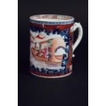 A MANDARIN PALETTE TANKARD with a dragon handle, painted with a riverside shipping scene, reserved