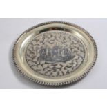 A MID 19TH CENTURY RUSSIAN SMALL SILVERGLT & NIELLOWORK SALVER OR TRAY circular with a tongue & dart