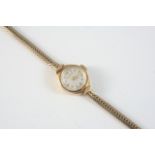 A LADY'S 9CT. GOLD WRISTWATCH BY MAPPIN the signed circular dial with one Arabic and with dagger