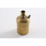 AN EARLY VICTORIAN BRASS "IMPROVED SAFETY PATENT VESTA LIGHT BOX" cylindrical with a nozzle to