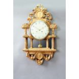 AN 18TH CENTURY SWEDISH GILTWOOD WALL CLOCK dial cream enamel, signed And..Lundfledl. Stockholm,