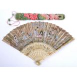 AN 18TH CENTURY CHINESE FAN carved ivory guards, pierced, painted & gilded sticks, paper leaves