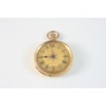 AN 18CT. GOLD OPEN FACED POCKET WATCH the gold decorated dial with Roman numerals, with engraved