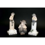 ROYAL COPENHAGEN FIGURES 3 figures, 433 Faun on Column with lizard, 456 Faun on Column with