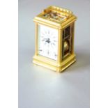 A CARRIAGE CLOCK dial white enamel, signed L ' Epee, subsidiary phases of the moon dial, day, hour