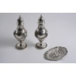 A PAIR OF LATE 19TH CENTURY GERMAN DECORATIVE CASTERS of urn form with ram's masks, festoons & stiff