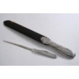 A PAPER KNIFE with a pen knife handle (fold-out stainless steel black) by Mappin & Webb, Sheffield