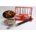 A MIXED LOT: A late Victorian mounted tortoiseshell paper knife, a modern manicure set with a