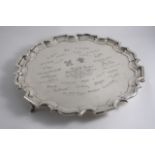 REGIMENTAL INTEREST: A large salver of shaped circular outline with a moulded border & a central