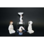 ROYAL COPENHAGEN FIGURES 4 figures, 2574 Toucan, 2342 Opium Smoker, 2342 Opium Smoker (all white),