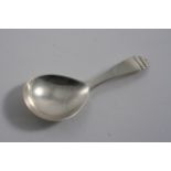 AN ART DECO REVIVAL CADDY SPOON with a "stepped" terminal, by Wakely & Wheeler, London 1949;  3.