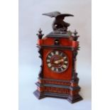 AN EBONISED AND BEECH CUCKOO CLOCK of architectural form, movement with two bellows and a spring