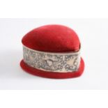 A LATE VICTORIAN MOUNTED, HEART-SHAPED PIN CUSHION / BOX covered in red velvet, the sides