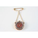 A LADY'S DIAMOND AND ENAMEL FOB WATCH the red guilloche enamel dial with gold Roman numerals, the