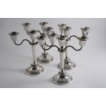 A PAIR OF MODERN THREE-LIGHT, DWARF CANDELABRA on round bases with reeded, S-scroll branches by Adie
