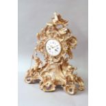 A GILT LACQUERED GILT BRONZE NEO ROCOCO MANTEL CLOCK dial white enamel with blue hour numerals,