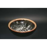 STUDIO POTTERY BOWL possibly by David Leach, a large stoneware bowl with a Tenmoku glaze to the