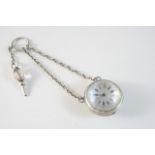 A LADY'S SILVER BULB EYE WATCH the circular white enamel dial with Roman numerals and outer red