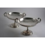 A PAIR OF TAZZAE OR DESSERT STANDS with shallow bowls & twin scroll handles, by Walker & Hall,