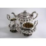 A GEORGE IV / WILLIAM IV THREE-PIECE TEA SET of melon fluted form with matted decoration around